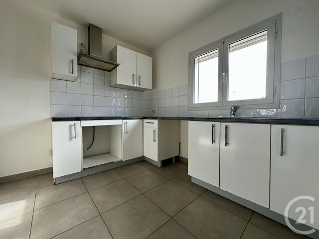 Appartement F3 &agrave; louer - 3 pi&egrave;ces - 55,26 m2 - Ste Genevieve Des Bois - 91 - ILE-DE-FRANCE